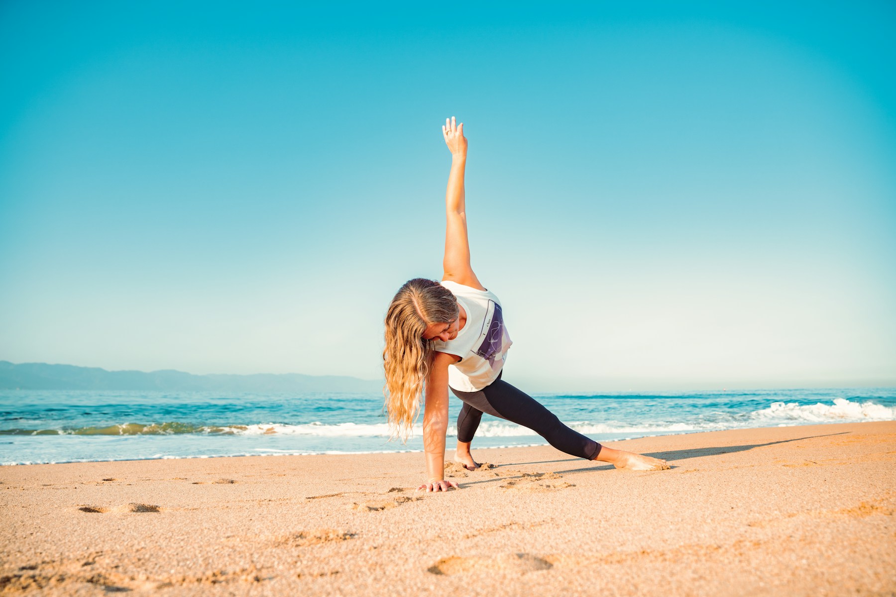 Beach yoga at sunrise